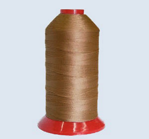 Filati in poliestere 100% alta tenacità colore cognac Filati in poliestere 100% alta tenacità colore cognac