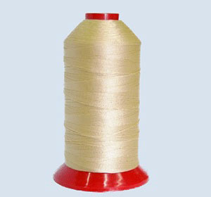 Filati in poliestere 100% alta tenacità colore miele Filati in poliestere 100% alta tenacità colore miele